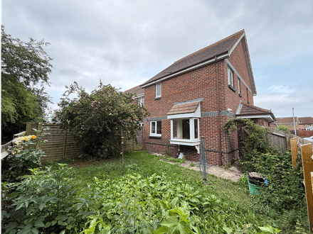 One bedroom end of terrace house with garden and parking space 